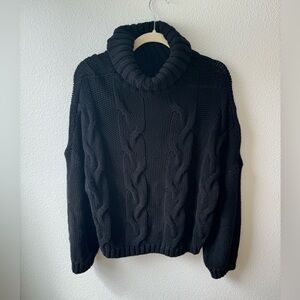 Women’s black knit turtleneck sweater